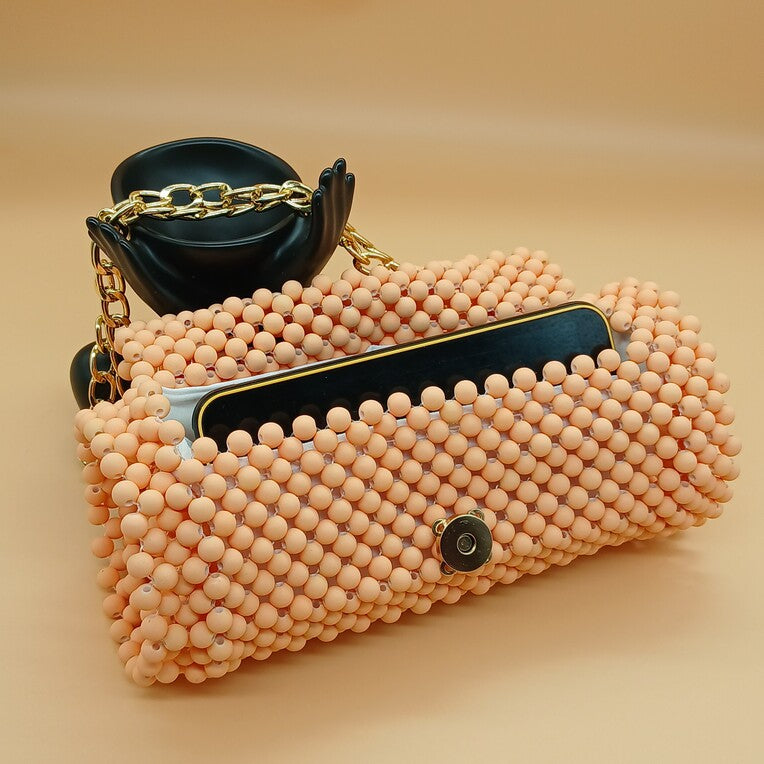 sac_main_perles_palmera_trousse_ocre-anna-chris_1