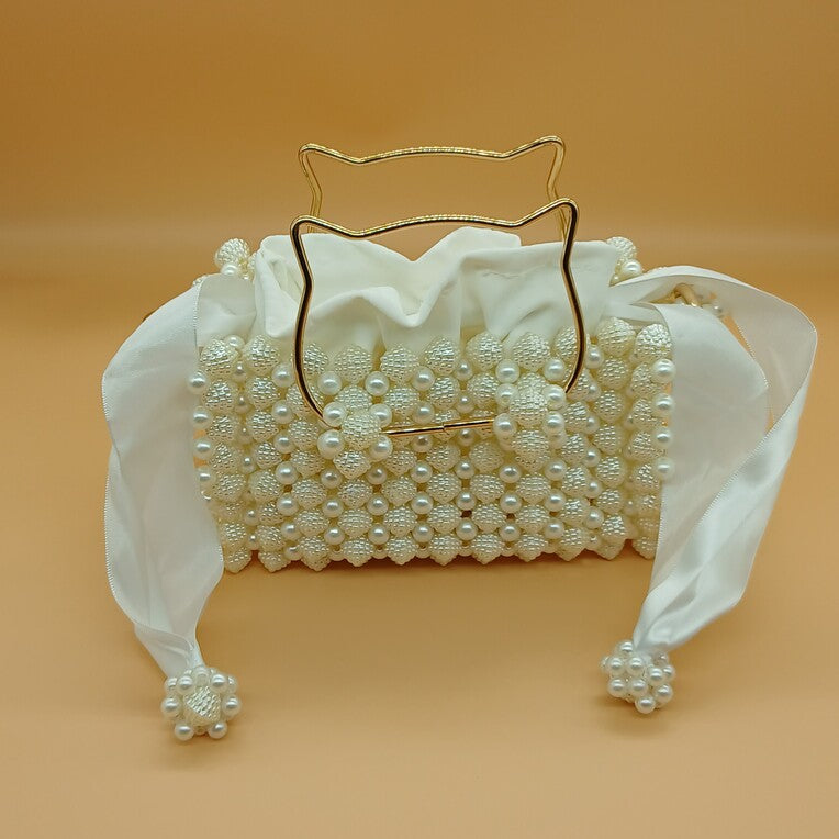 sac-main-perles-sultana-majesté-anna-chris1